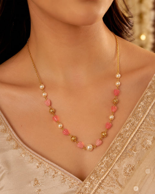 FeelOri gold-polished necklace styled with Indian occasion wear