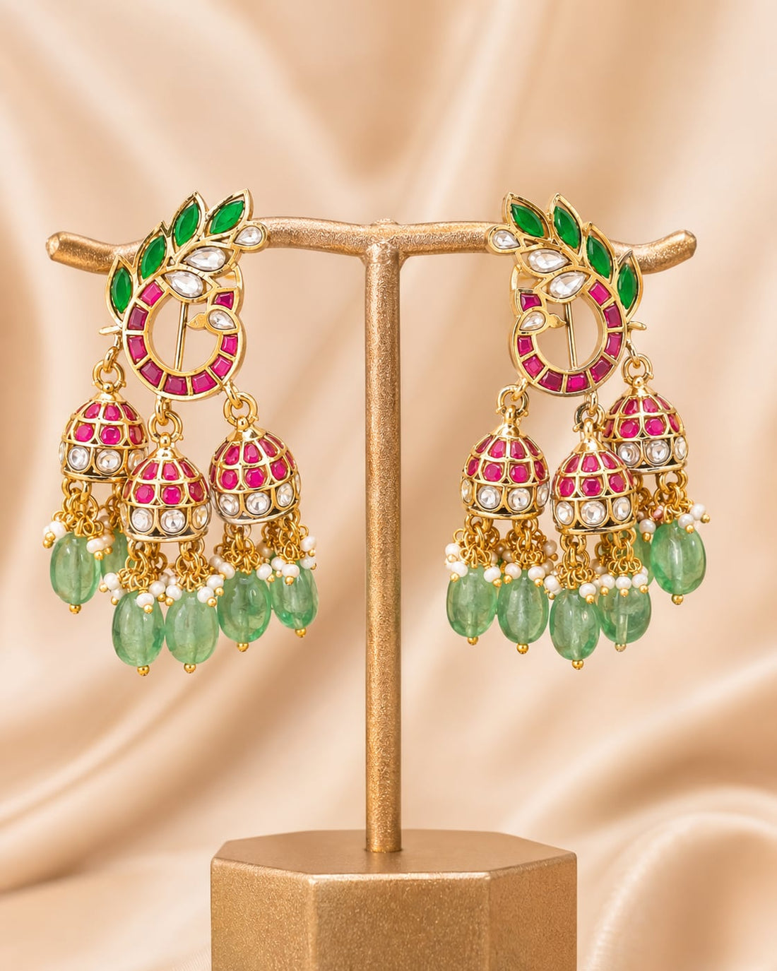 FeelOri jadau kundan jhumka earrings stone setting, ear-chain or earring construction, and gold-polished detail