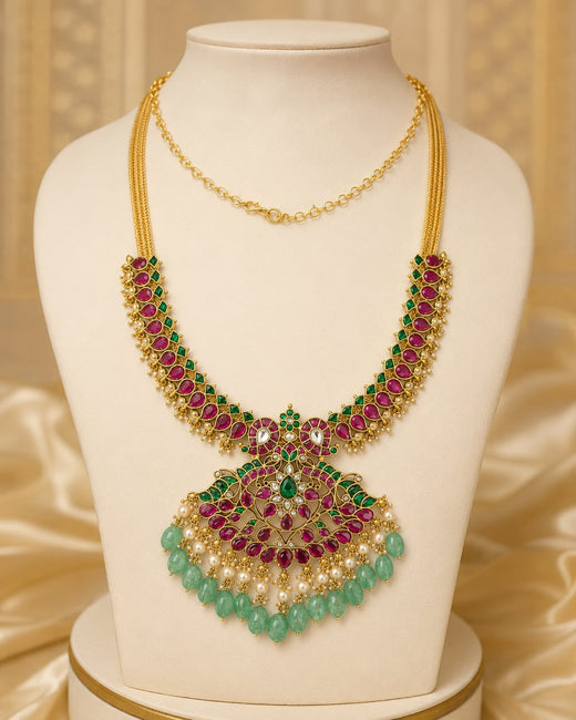 FeelOri ruby green peacock motif jadau kundan necklace with large pendant on display