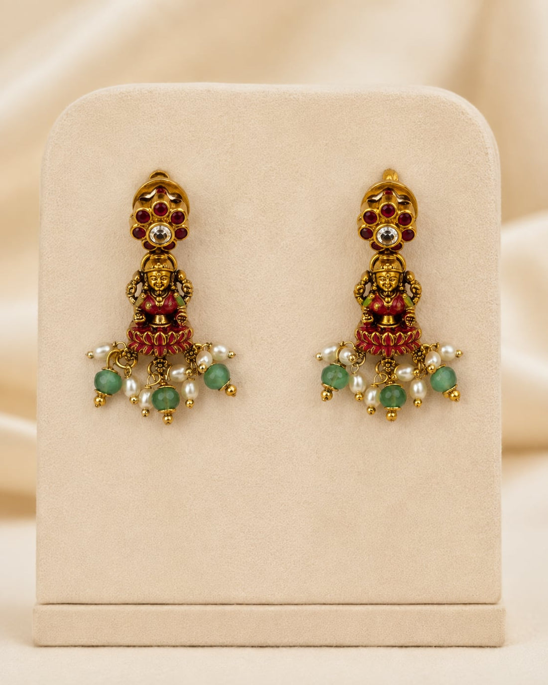 FeelOri ruby and emerald necklace set with matching earrings matching earrings only on a clean jewellery display