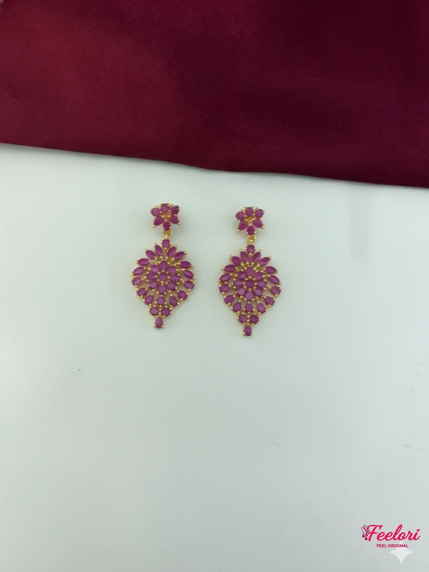 FeelOri Gold Plated Ruby Leaf Cluster Earrings - Detailed view of the matching earrings, highlighting the vibrant ruby-hued stones and craftsmanship.