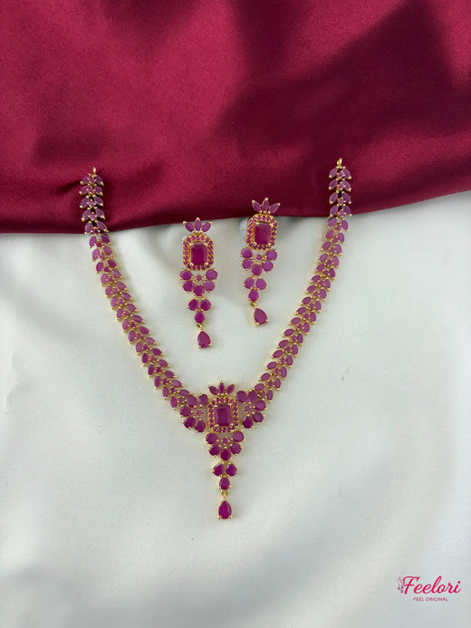 FeelOri Gold Plated Ruby Petal Necklace Set - Front view showcasing the complete cascading design with matching earrings.