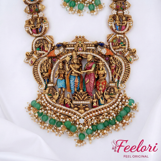 FeelOri Necklace - Detailed view of the central pendant, highlighting the intricate Meenakari figures, green beads, and pearl clusters.
