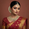 Indian model in elegant traditional attire showcasing FeelOri's sparkling AD stone necklace, embodying timeless heritage and 'Parampara Sparkle,' in a high-definition, minimalistic photograph.