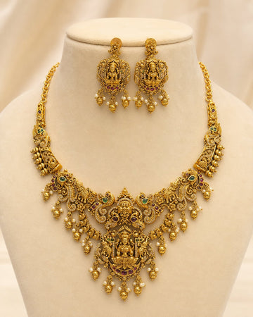 Antique gold-polished temple jewellery necklace set by FeelOri