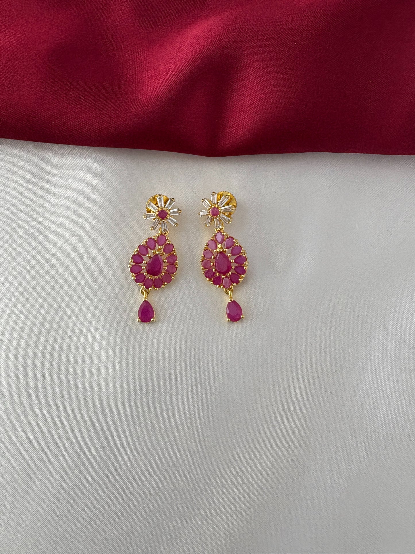 FeelOri Gold Plated Ruby Floral Cluster Earrings - Close-up view of the matching earrings with their detailed ruby stone settings and crystal accents.