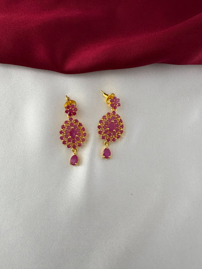 FeelOri Gold Plated Ruby Flower Earrings - Close-up view of the matching push-back earrings with their intricate ruby-hued floral cluster design and tear-drop dangle.