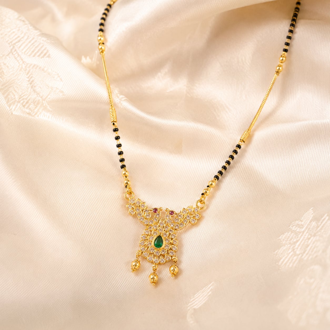 FeelOri black-bead mangalsutra pendant necklace styled with Indian occasion wear