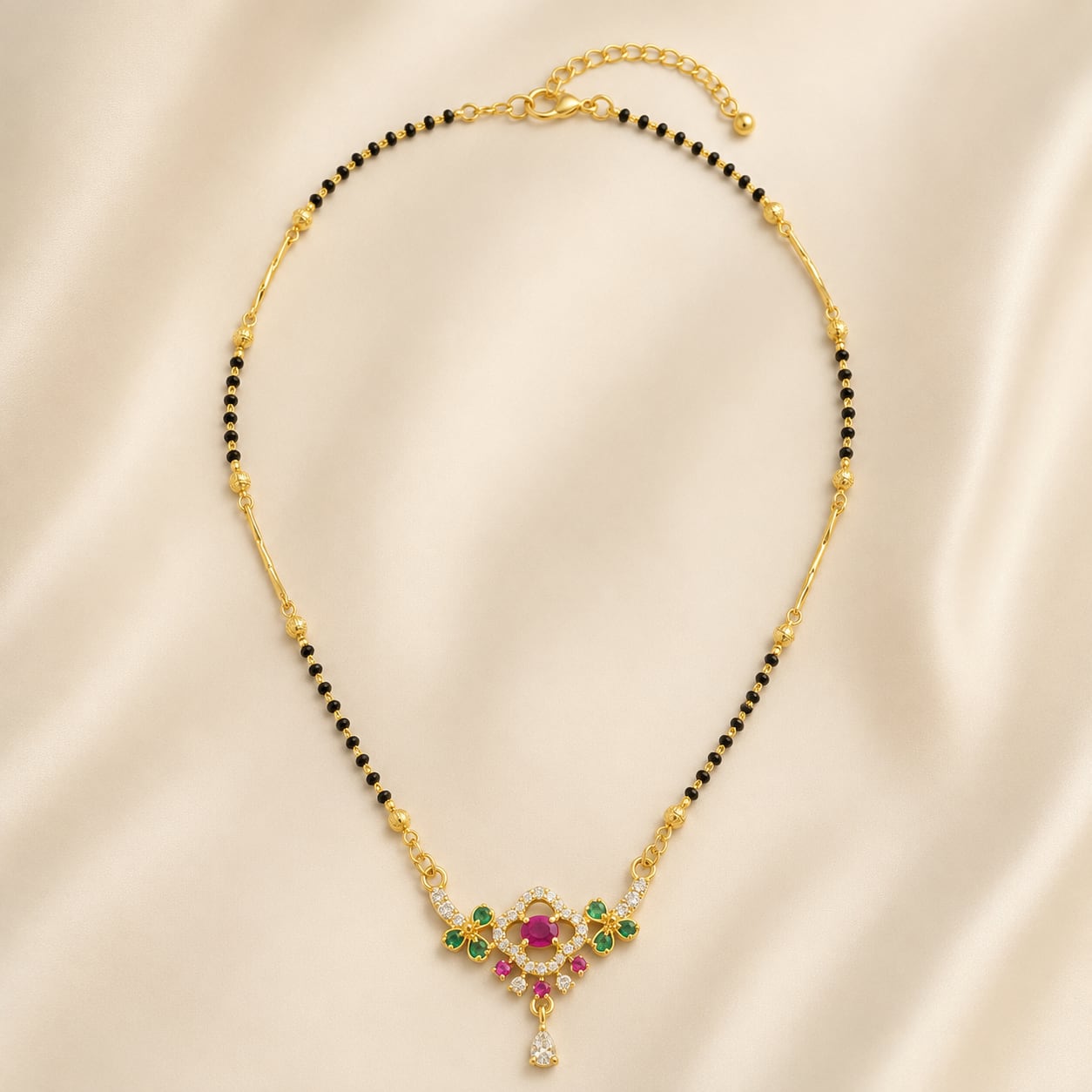 FeelOri black-bead mangalsutra pendant necklace styled with Indian occasion wear