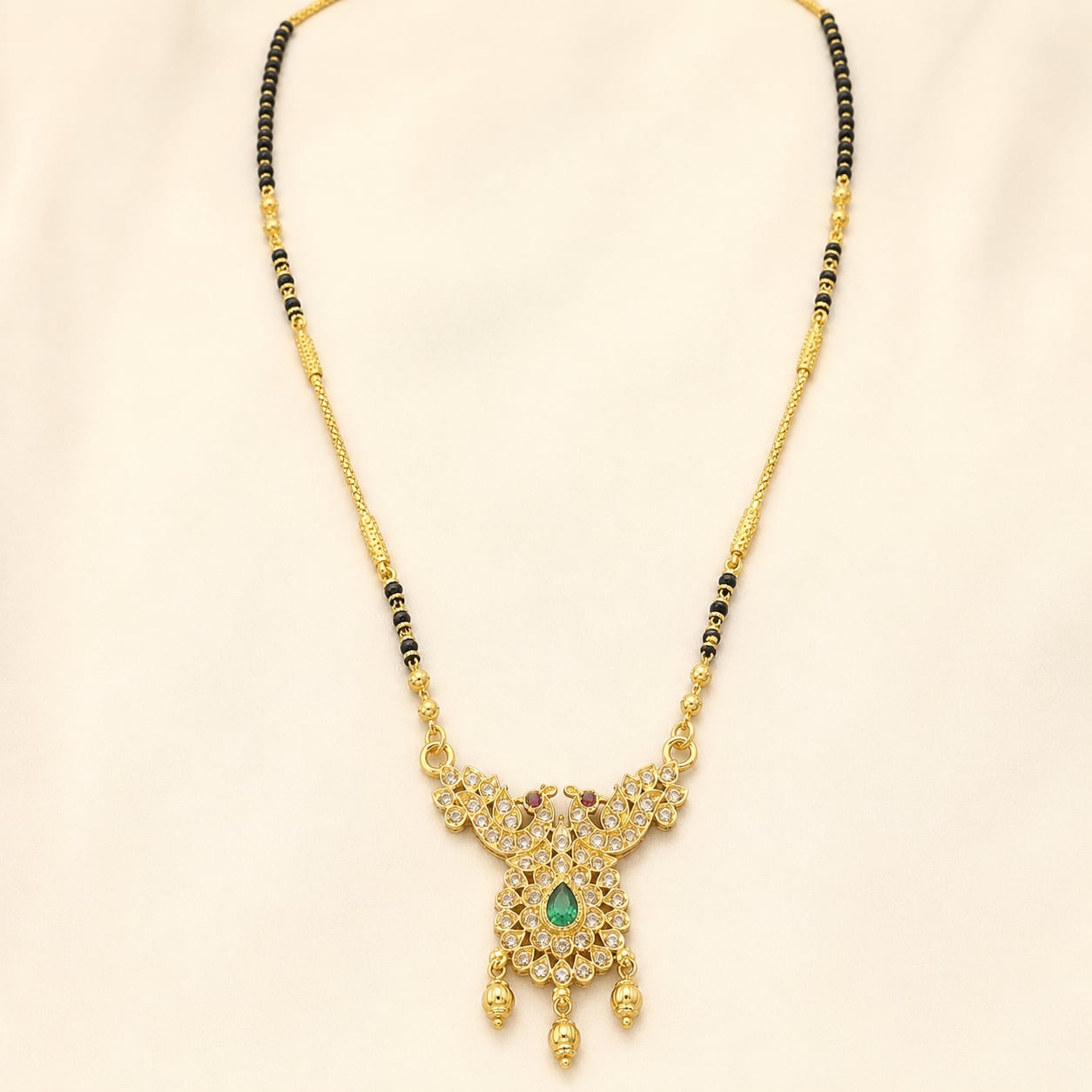 FeelOri black-bead mangalsutra pendant necklace styled with saree fabric for Indian occasion wear