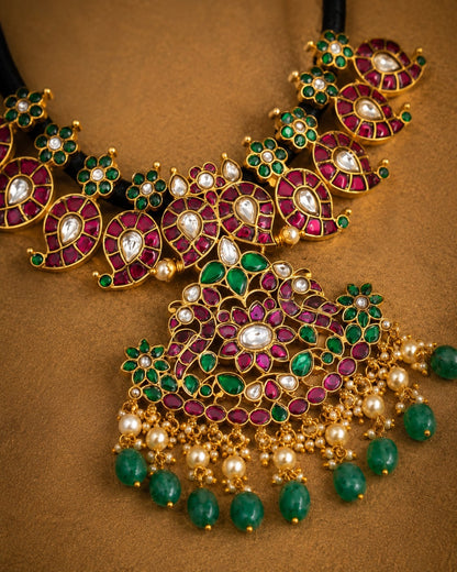 FeelOri black-toned bead floral pendant jadau kundan necklace styled with saree fabric