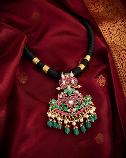 FeelOri black-toned bead pendant jadau kundan necklace styled with saree fabric
