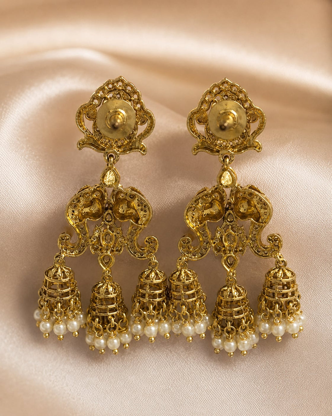 FeelOri emerald earrings rear view showing openwork reverse, straight posts, and push-back closures