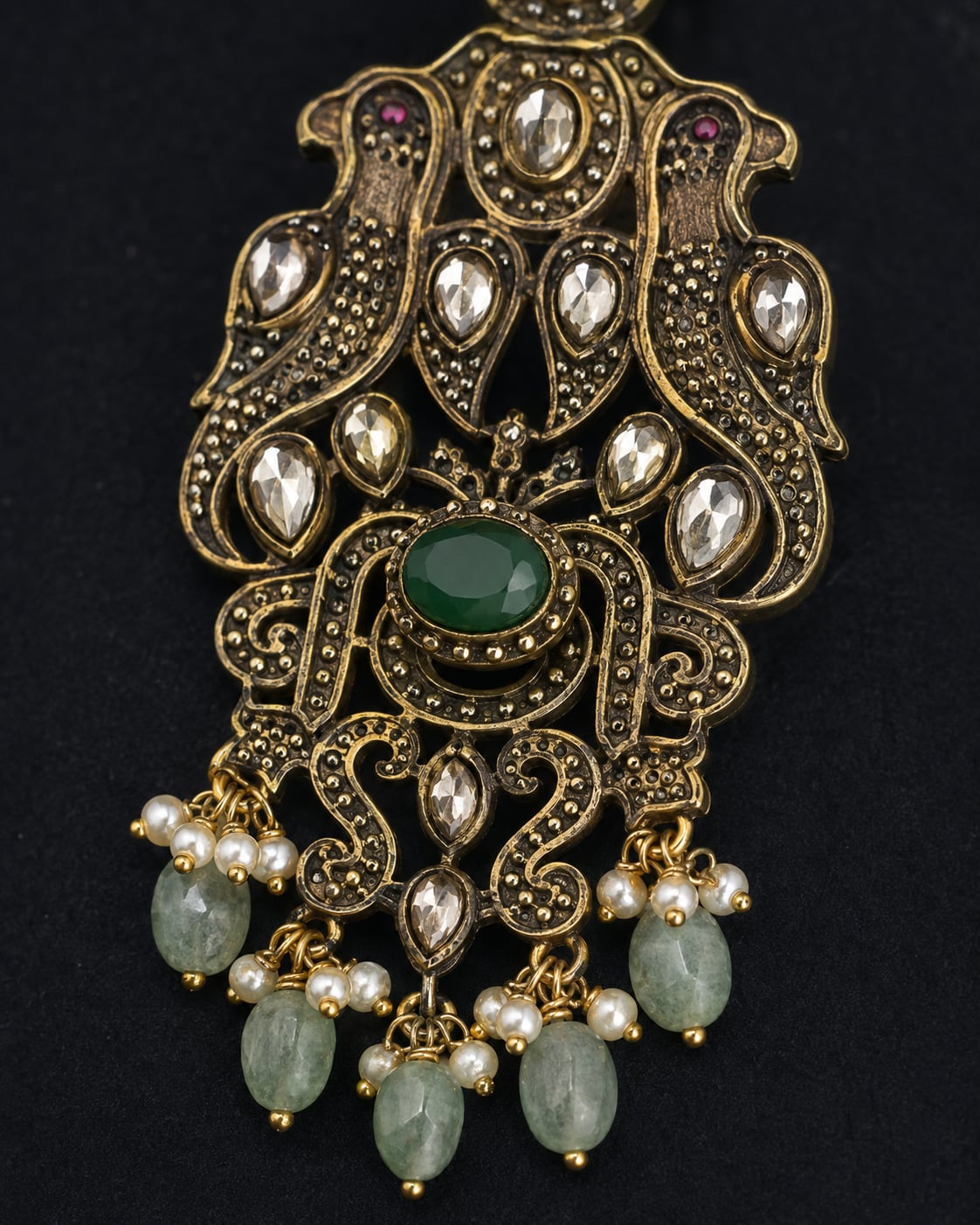 FeelOri emerald earrings stone setting, ear-chain or earring construction, and gold-polished finish detail