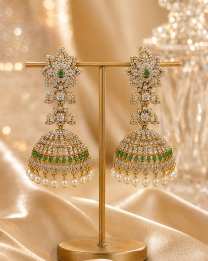 FeelOri emerald jhumka earrings on jewellery display
