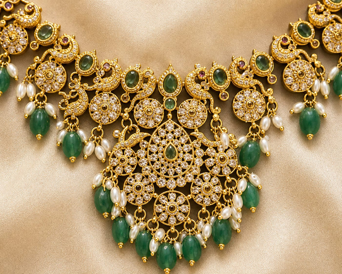 FeelOri Emerald Layered Teardrop AD/CZ Necklace Set with matching earrings, saree styling view