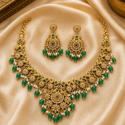 FeelOri emerald-tone necklace set with matching earrings for sarees and festive styling