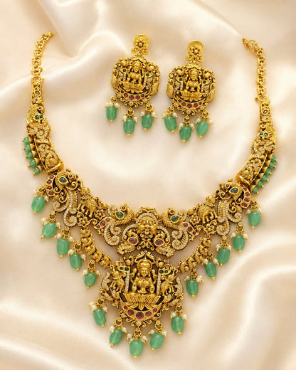 FeelOri emerald-tone necklace set with matching earrings for sarees and festive styling