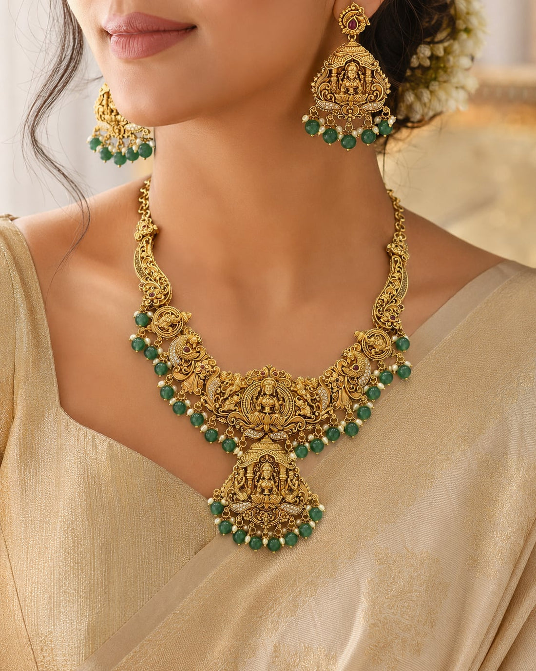 FeelOri Emerald Lakshmi Drop Necklace Set for Pattu Sarees with matching earrings, jewellery display view