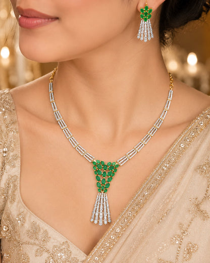 FeelOri emerald-tone necklace set with matching earrings styled with saree fabric for Indian occasion wear