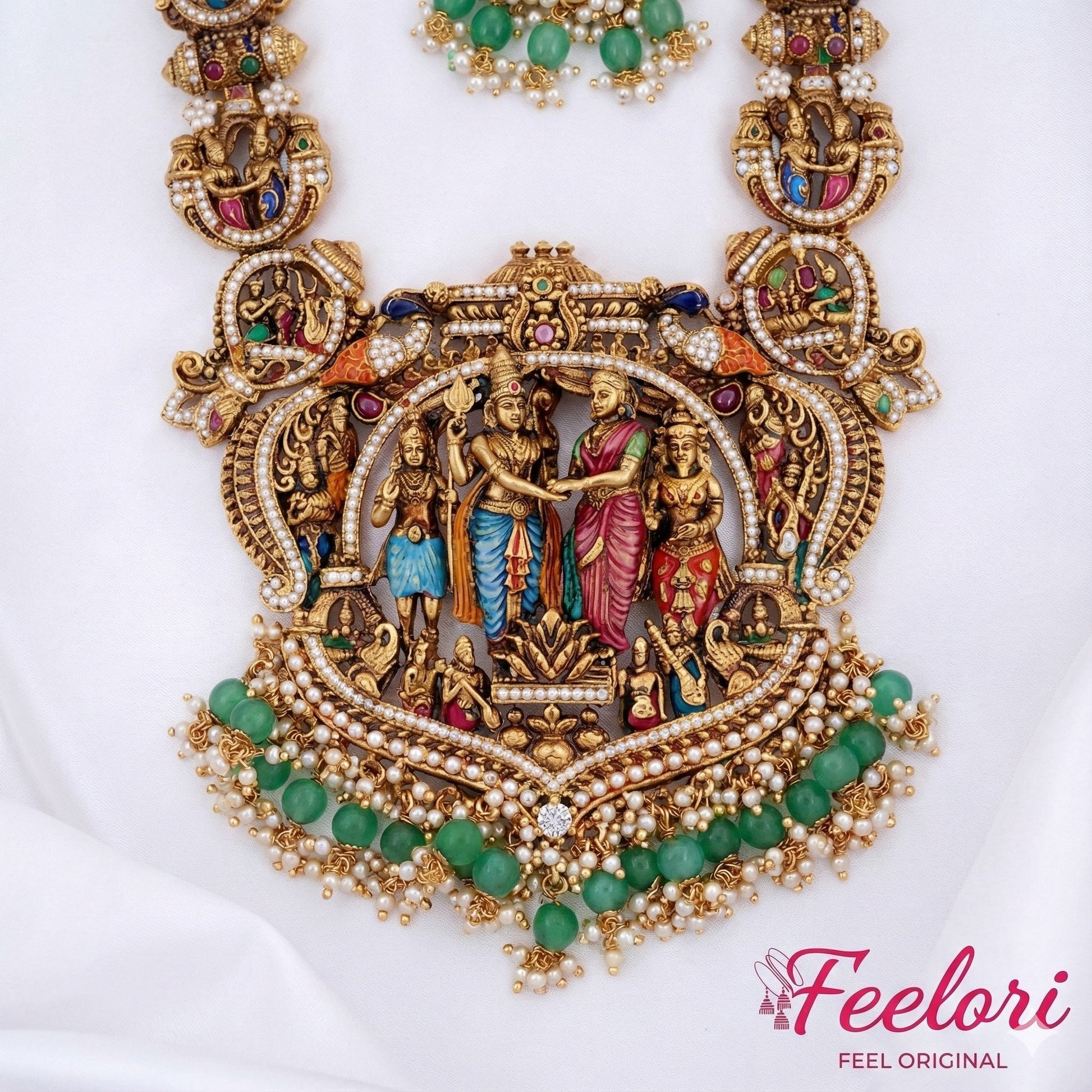 FeelOri Necklace - Detailed view of the central pendant, highlighting the intricate Meenakari figures, green beads, and pearl clusters.