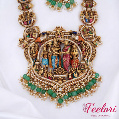 FeelOri Necklace - Detailed view of the central pendant, highlighting the intricate Meenakari figures, green beads, and pearl clusters.