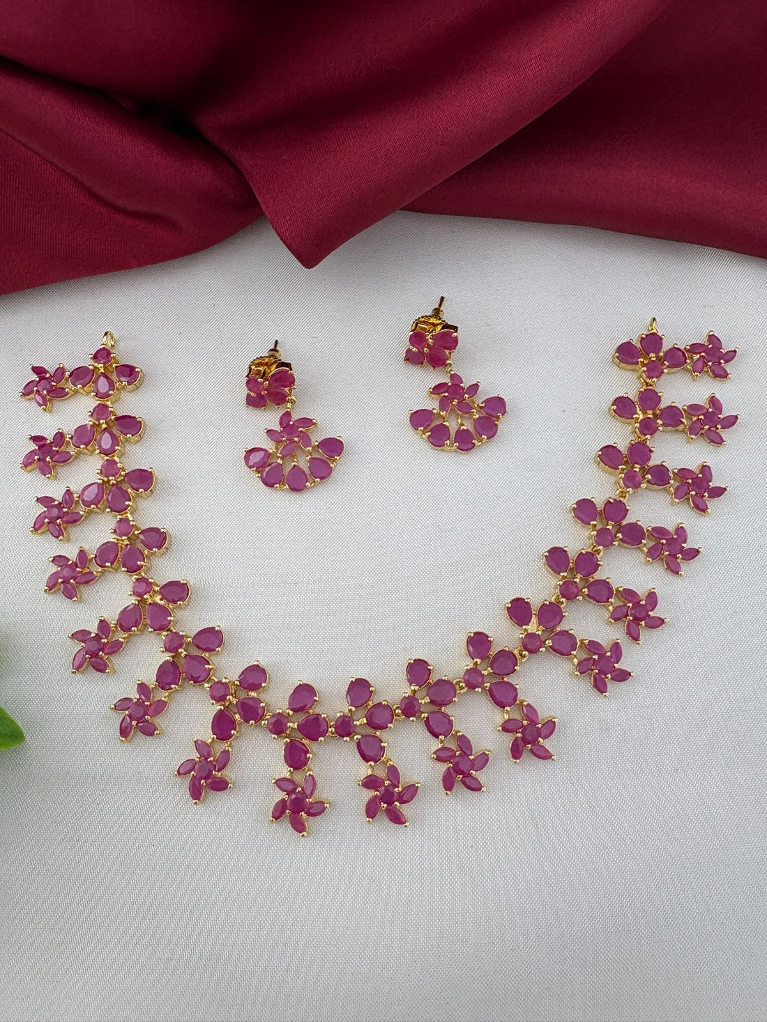 FeelOri Antique Finish Ruby-Tone CZ Short Necklace Set with matching earrings - Collector's Item. Full view of the ruby floral design necklace and earring pair.
