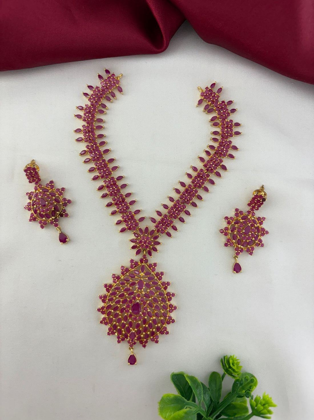 FeelOri Bold Statement Ruby-Tone CZ Short Necklace Set with matching earrings elegantly displayed.