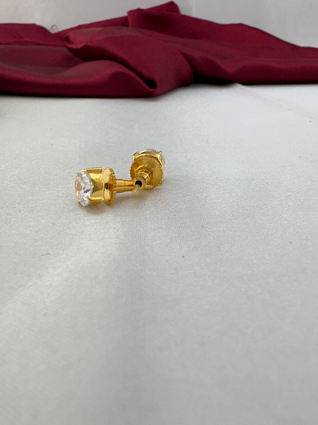 FeelOri bright white marquise-cut AD stud earrings side view showing post and back