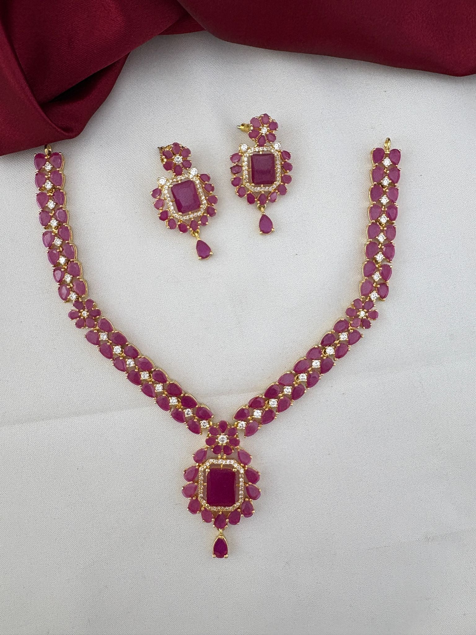 Alternate angle of FeelOri Cascade Ruby & AD Vine Necklace Set. Chennai Elegance design by feelori.