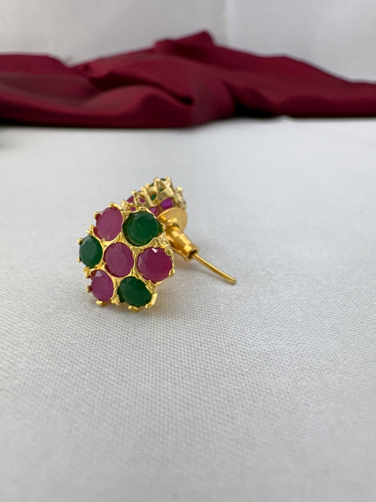 FeelOri Cherry Blossom Pink Forest Green AD studs angled view showing gold post construction and comfortable back