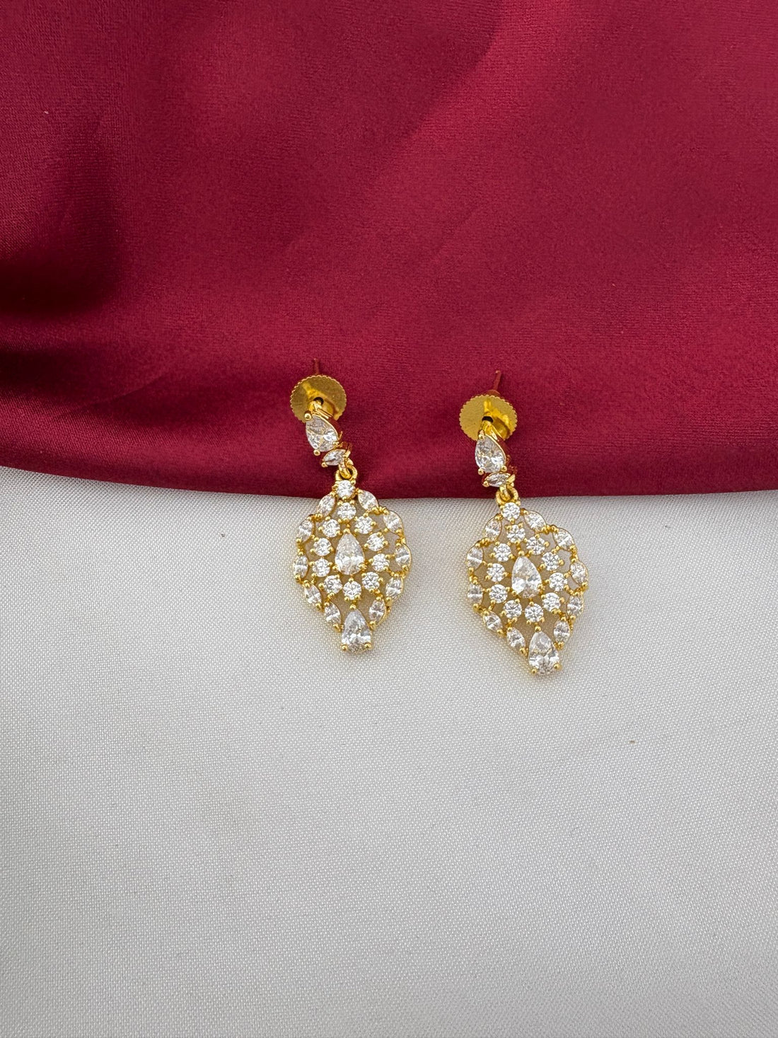 Detailed close-up of the AD stone earrings from the FeelOri Contemporary Chic Geometric Short Necklace Set by feelori