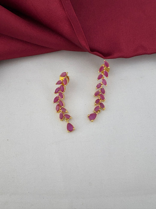 Detailed close-up of FeelOri's Elegant Ruby-Tone CZ Earrings, part of the short necklace set for Bangalore events, showcasing the marquise-cut ruby stones.