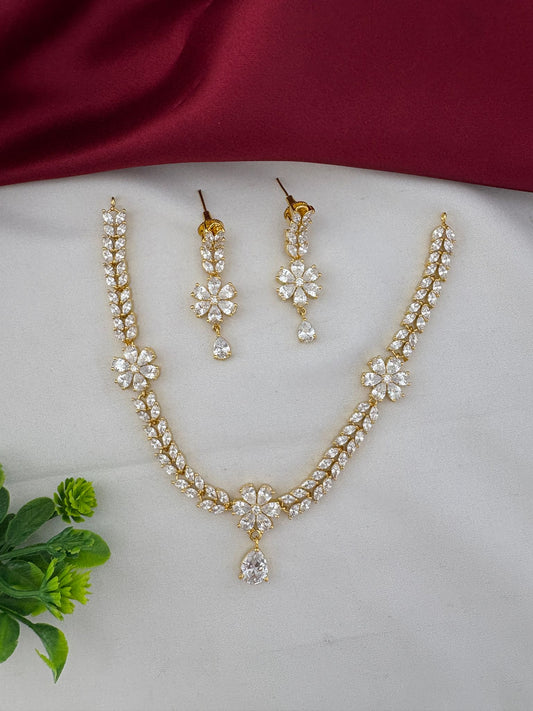 FeelOri Everyday Elegance AD Stone Pendant Short Necklace and Earrings Set - Full view on white and maroon fabric