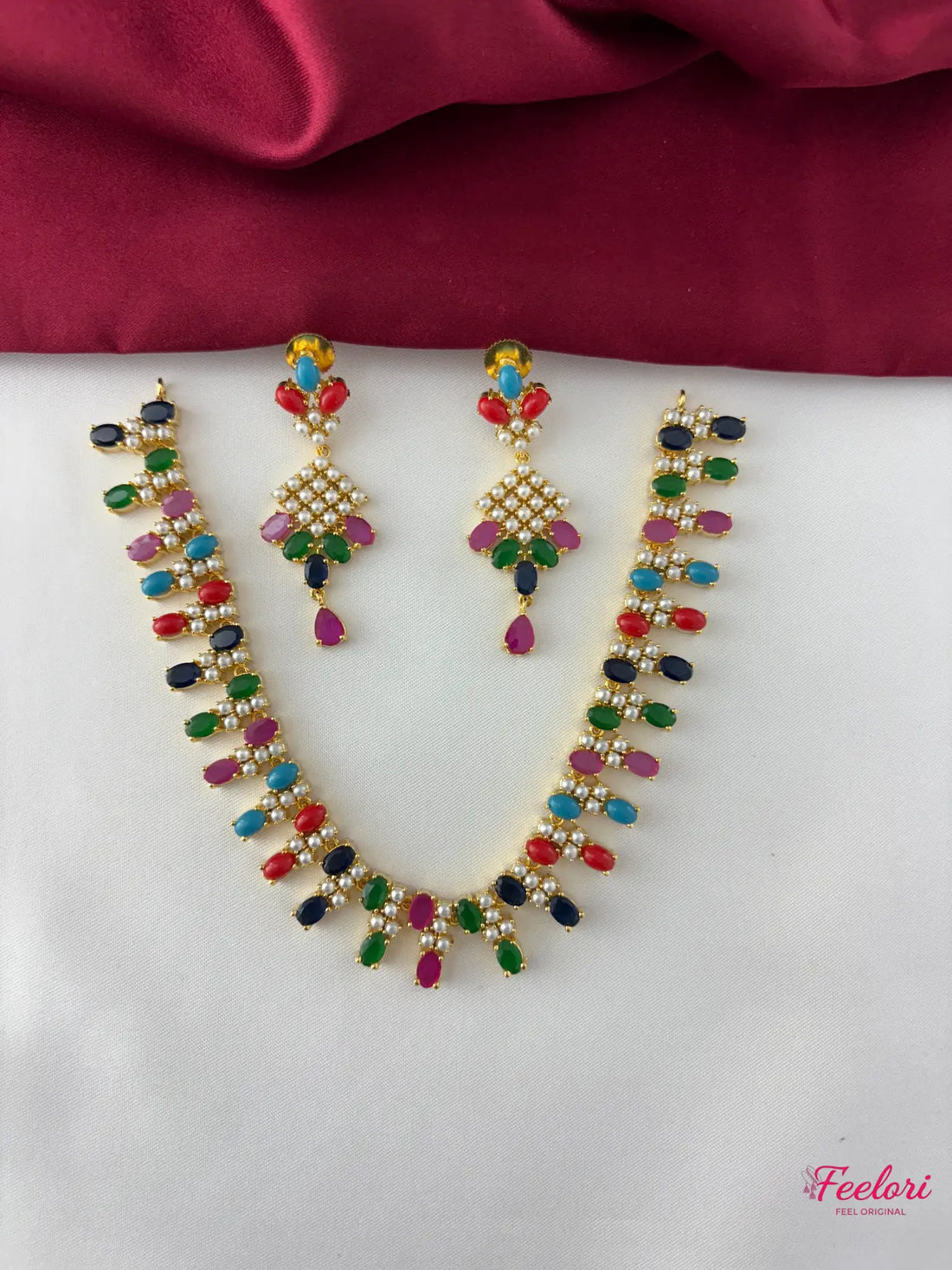 FeelOri Gold Plated Multicolor Gemstone Necklace Set - Front view showcasing the full set with vibrant leaf-like stone patterns and tear-drop earrings.
