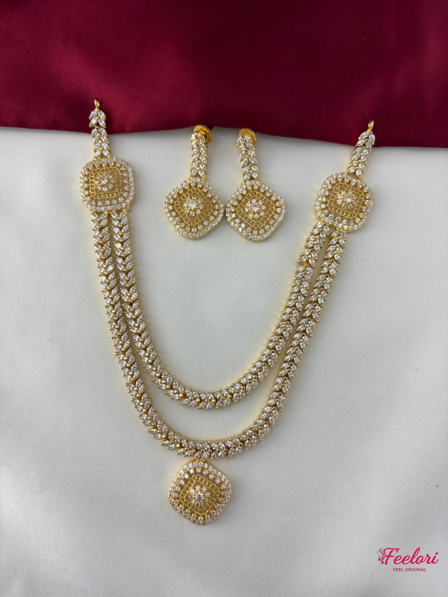 FeelOri Gold Plated Diamond Stimulant Layered Necklace Set - Front view showcasing the complete set with intricate square motifs and tiered design.
