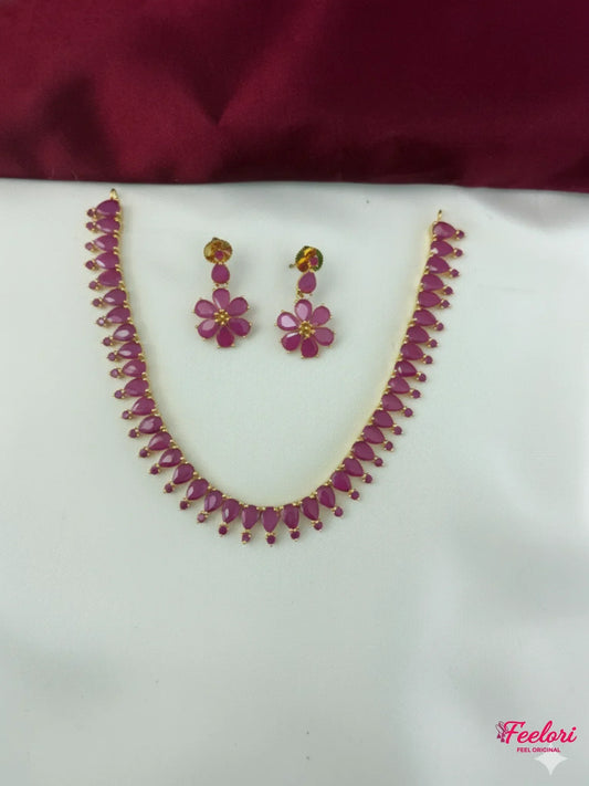 FeelOri Gold Plated Fuchsia Teardrop Flower Necklace Set - Front view showcasing the delicate necklace and matching floral earrings.