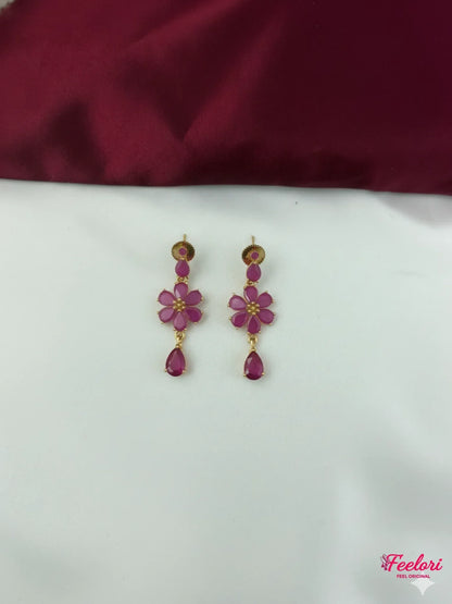 FeelOri Gold Plated Fuchsia Teardrop Flower Earrings - Close-up view of the intricate floral design and drop stone.