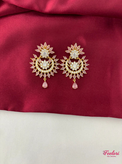 FeelOri Gold Plated Petal AD Earrings - Detailed view of the crescent-shaped earrings adorned with genuine American Diamonds and delicate pink stone drops.