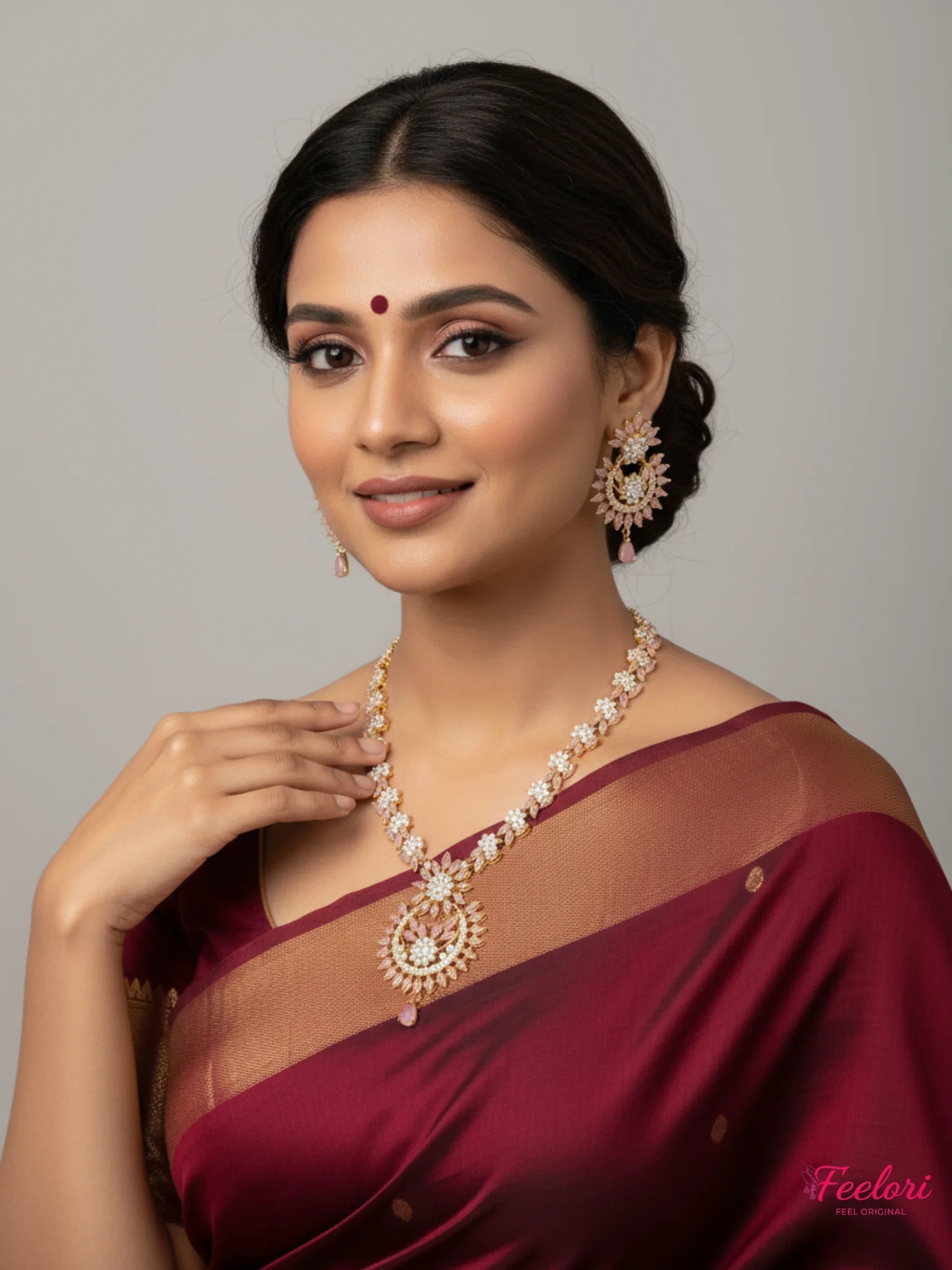 FeelOri Gold Plated Petal AD Necklace Set - Model wearing elegant set with traditional saree, smiling at camera