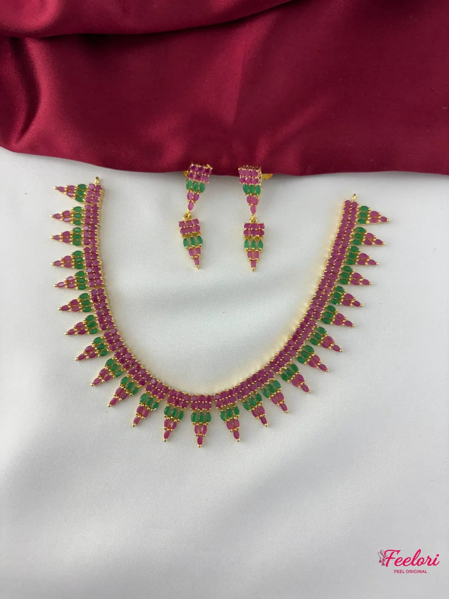 FeelOri Gold Plated Ruby Emerald Layered Necklace Set - Full view showcasing the vibrant genuine stones and matching earrings.