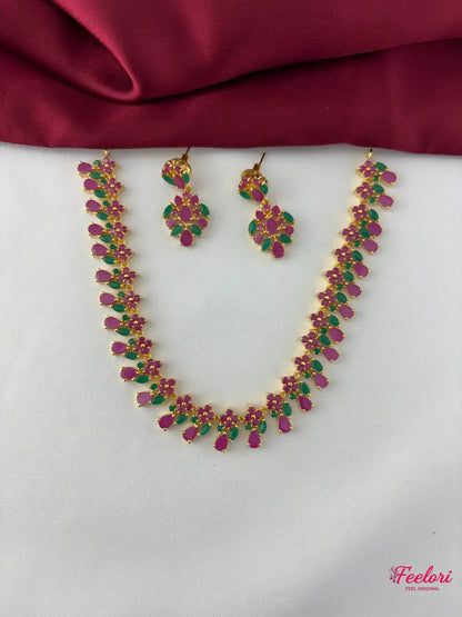 FeelOri Gold Plated Ruby Emerald Necklace Set - Front view showcasing the full necklace and matching earrings with clustered floral stone arrangements.