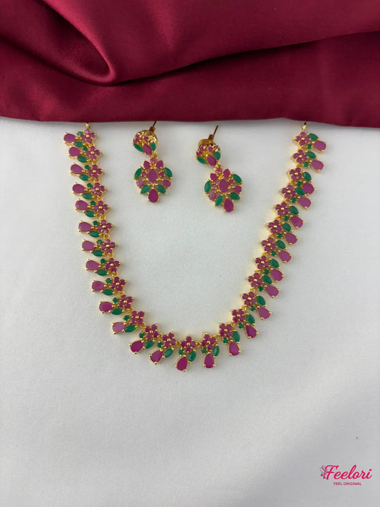 FeelOri Gold Plated Ruby Emerald Necklace Set - Front view showcasing the full necklace and matching earrings with clustered floral stone arrangements.