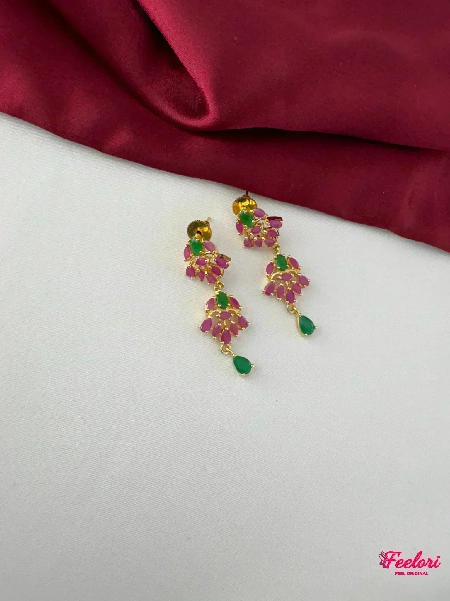 FeelOri Gold Plated Ruby Emerald Earrings - Detailed view of the matching earrings with teardrop emerald accent and floral ruby clusters.