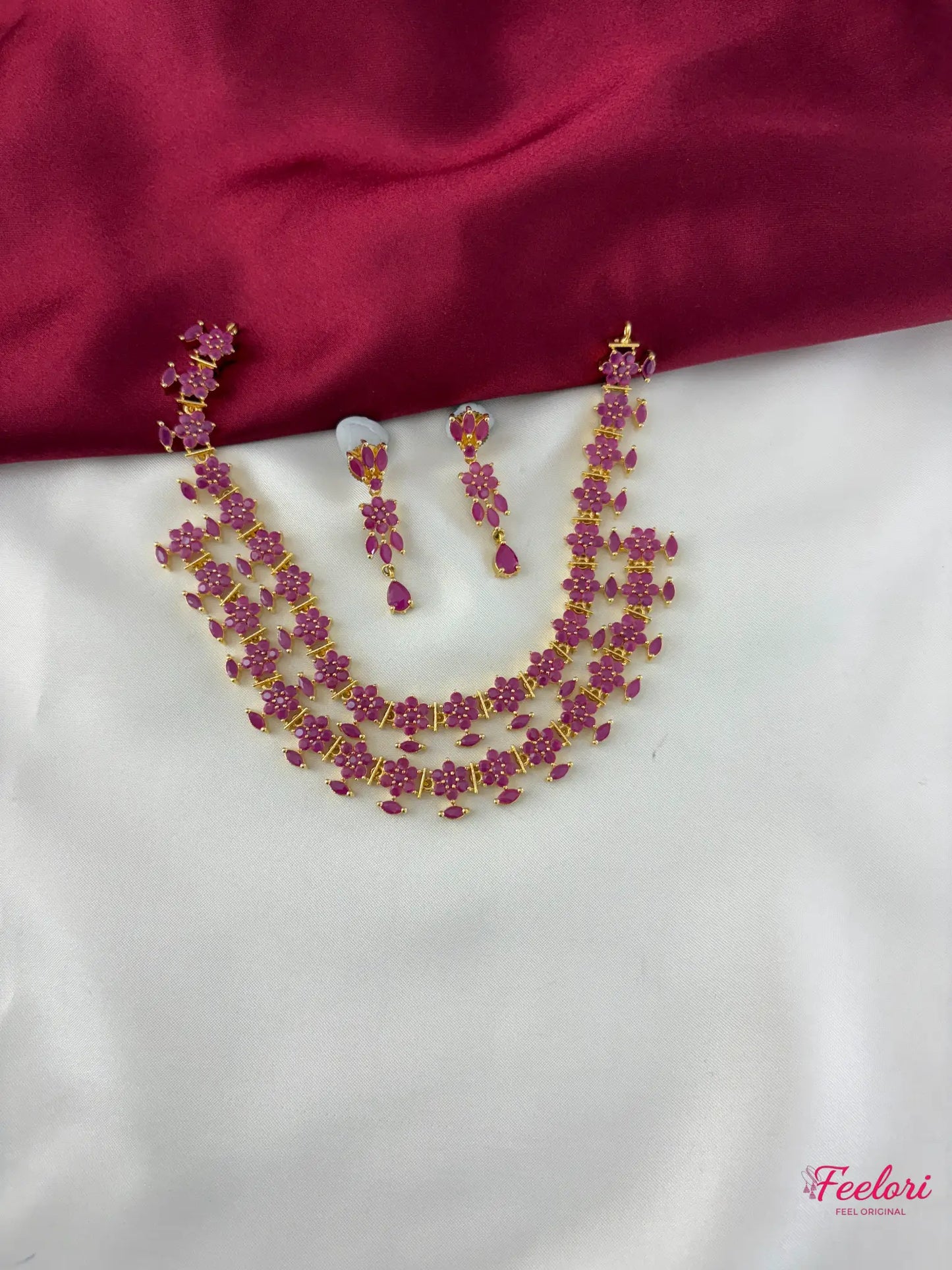 FeelOri Gold Plated Ruby Floral Layered Necklace Set - Front view showcasing the two-tiered design and matching earrings.