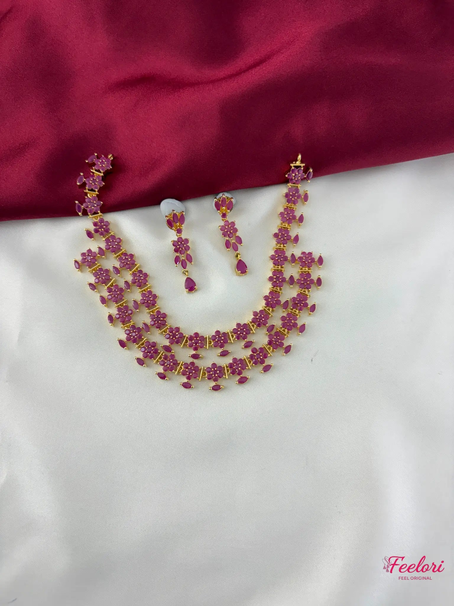 FeelOri Gold Plated Ruby Floral Layered Necklace Set - Front view showcasing the two-tiered design and matching earrings.