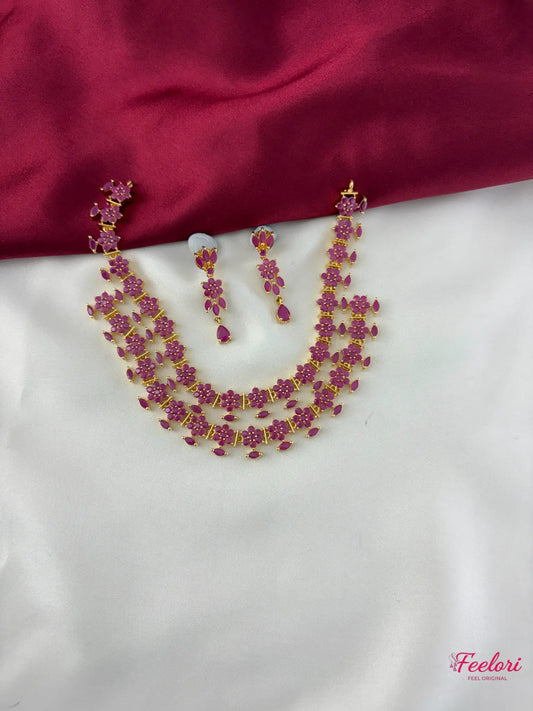 FeelOri Gold Plated Ruby Floral Layered Necklace Set - Front view showcasing the two-tiered design and matching earrings.