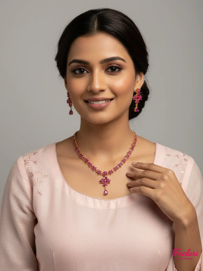 FeelOri Gold Plated Ruby Floral Necklace Set - Model wearing elegant set with light pink attire.