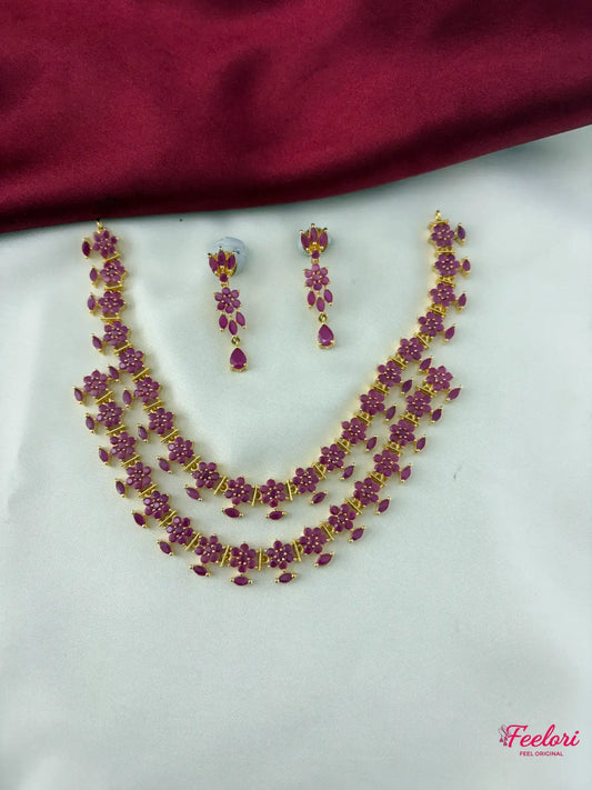 FeelOri Gold Plated Ruby Floral Necklace Set - Full view showing double-tiered necklace with matching drop earrings.