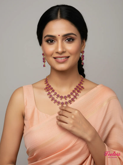 FeelOri Gold Plated Ruby Necklace Set - Model wearing elegant tiered floral set with traditional saree.
